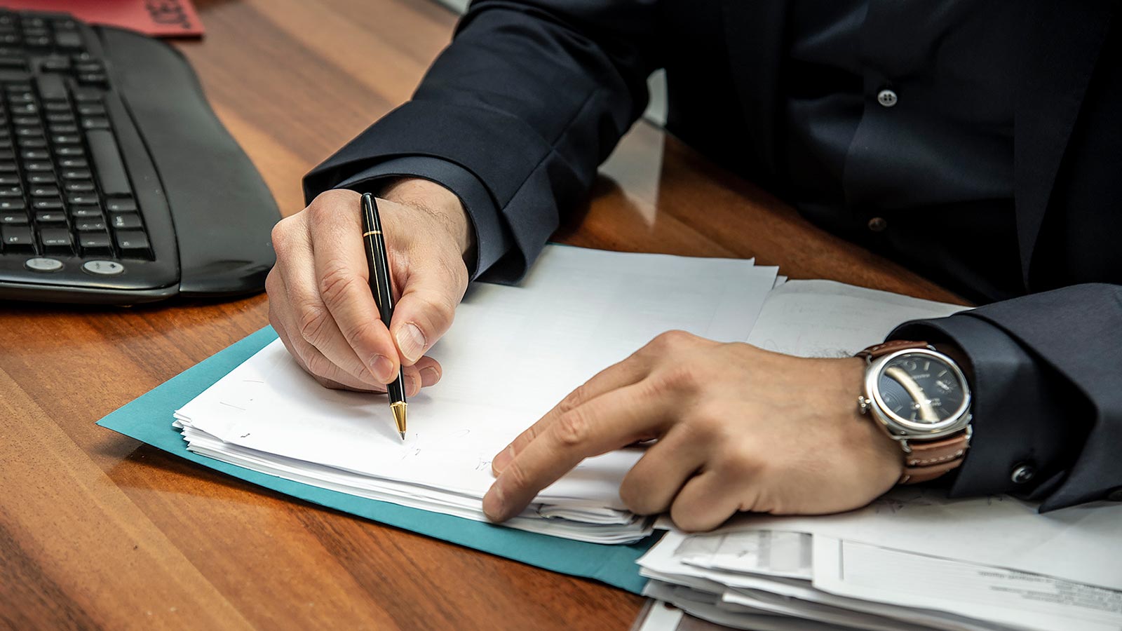 Two hands of a business consultant at Unicidata in Bolzano